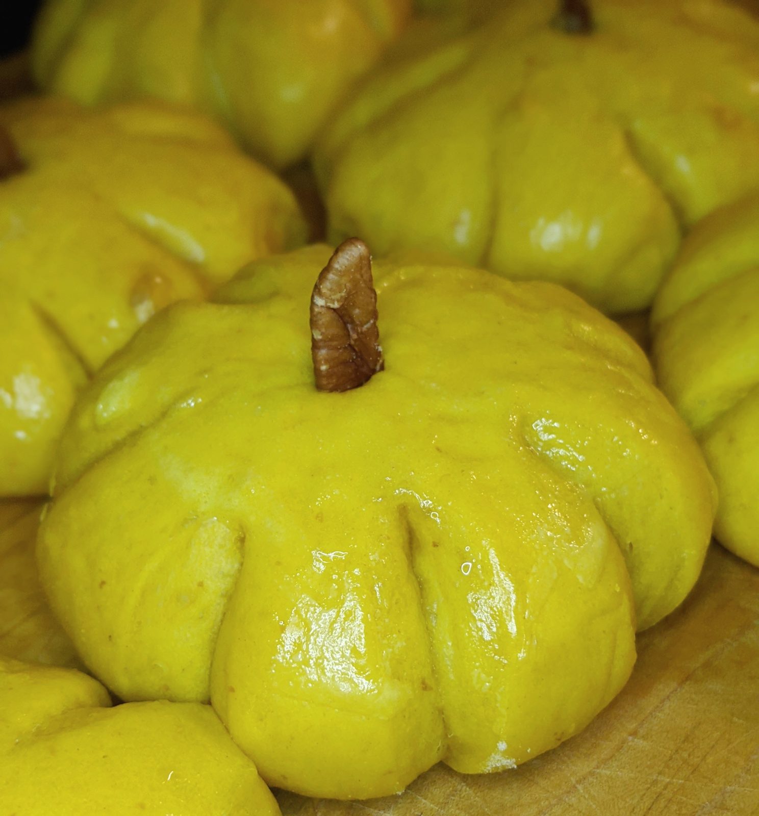 Whole butternut squash on a wooden board