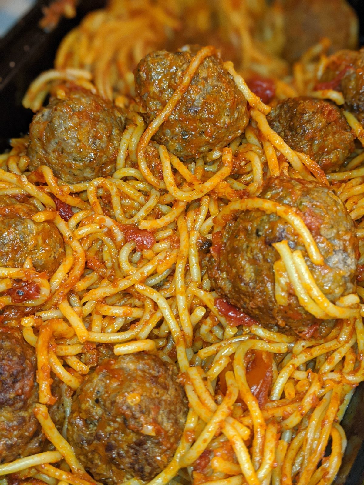 Spaghetti and meatballs in a rich tomato sauce