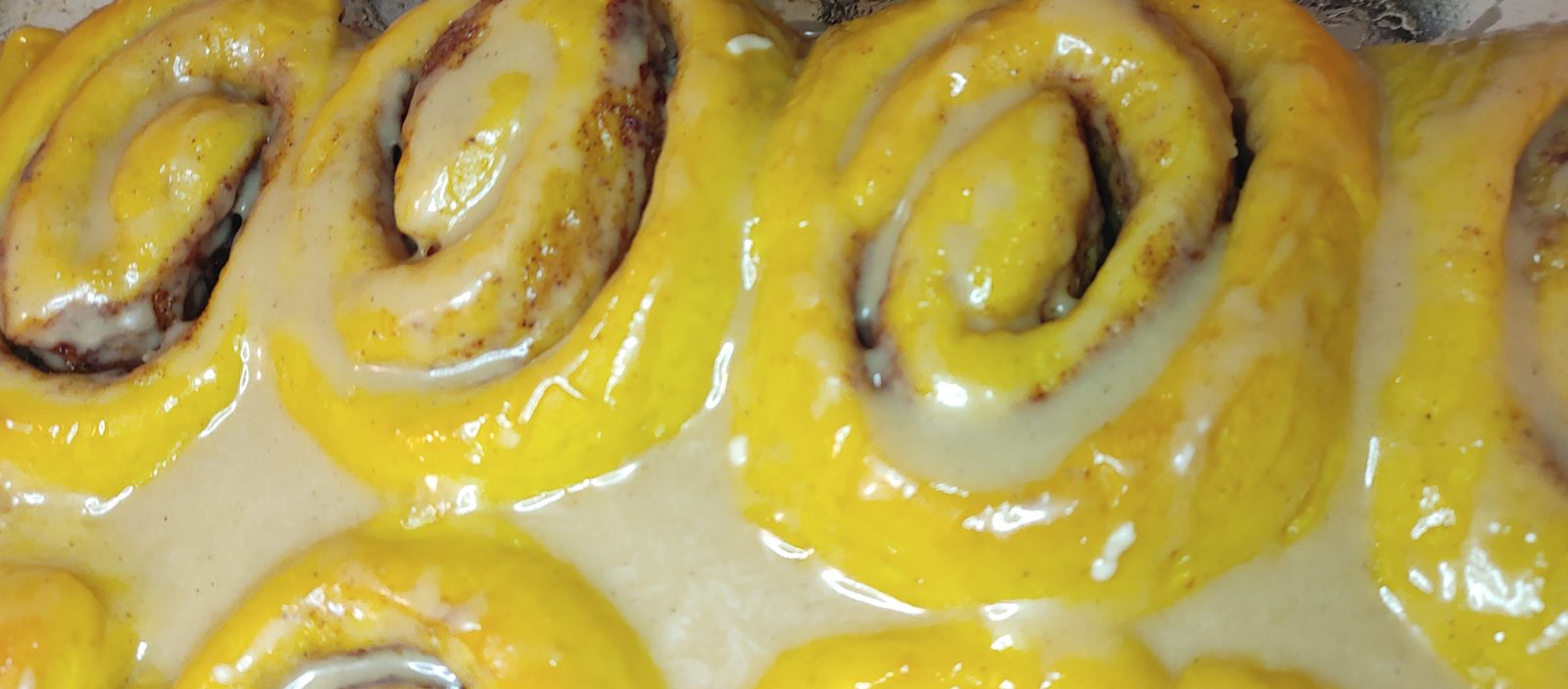 Close-up of a glazed cinnamon roll